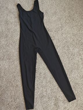 Sleek Black Scoop-Neck Sleeveless Jumpsuit